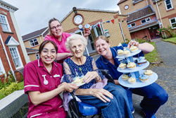 A Shropshire nursing home threw open its doors to the public as staff and residents raised money for a dementia charity. 